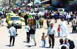 صورة وزعتها سانا لعودة الحياة إلى طبيعتها في مدينة درعا